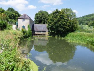 Sample wide-angle image of a heron on a lake taken with the Pentax WG-90