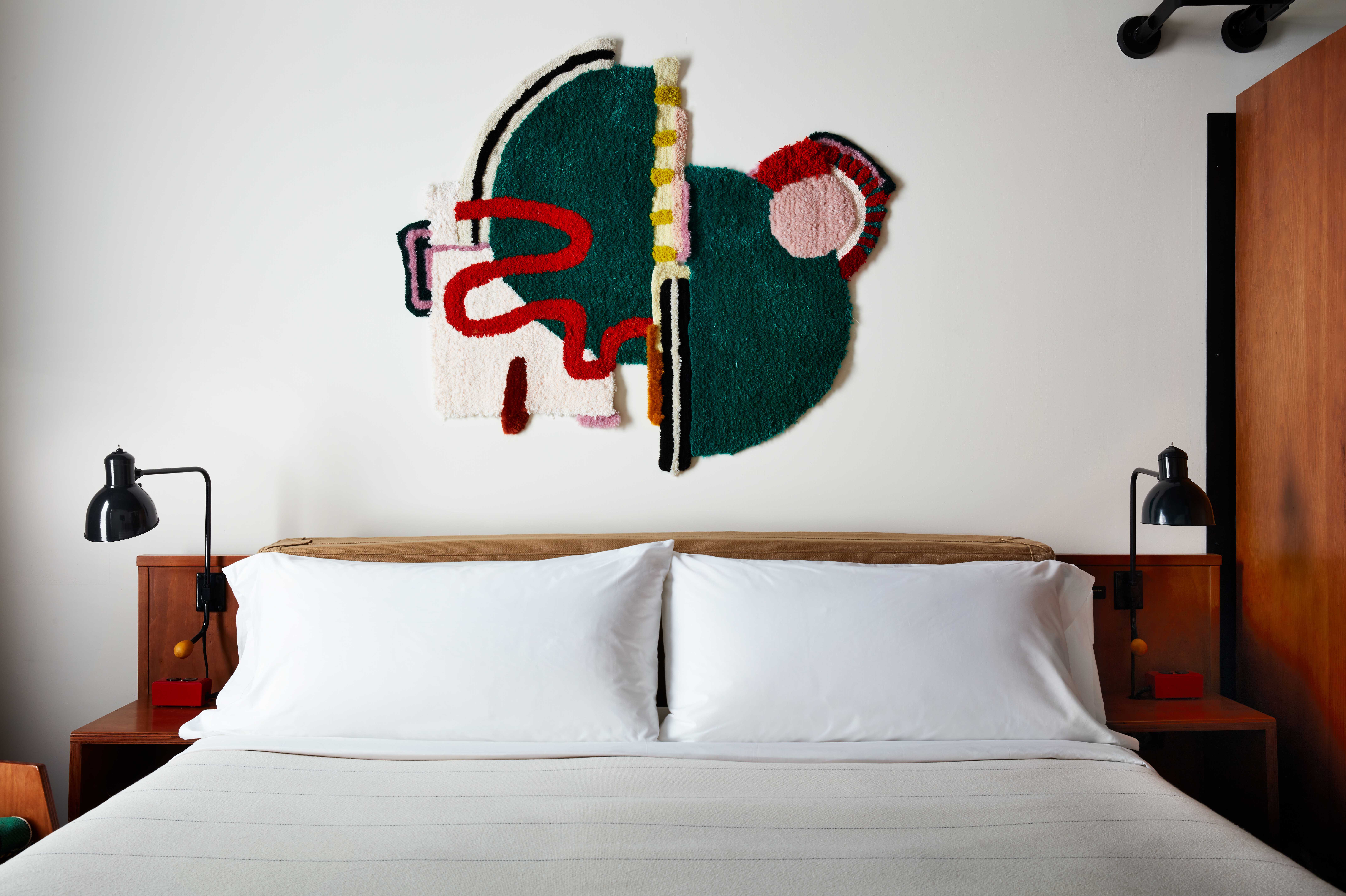 Brutalist-style hotel interior with mid-century furniture