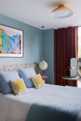 Bedroom with cool light blue walls