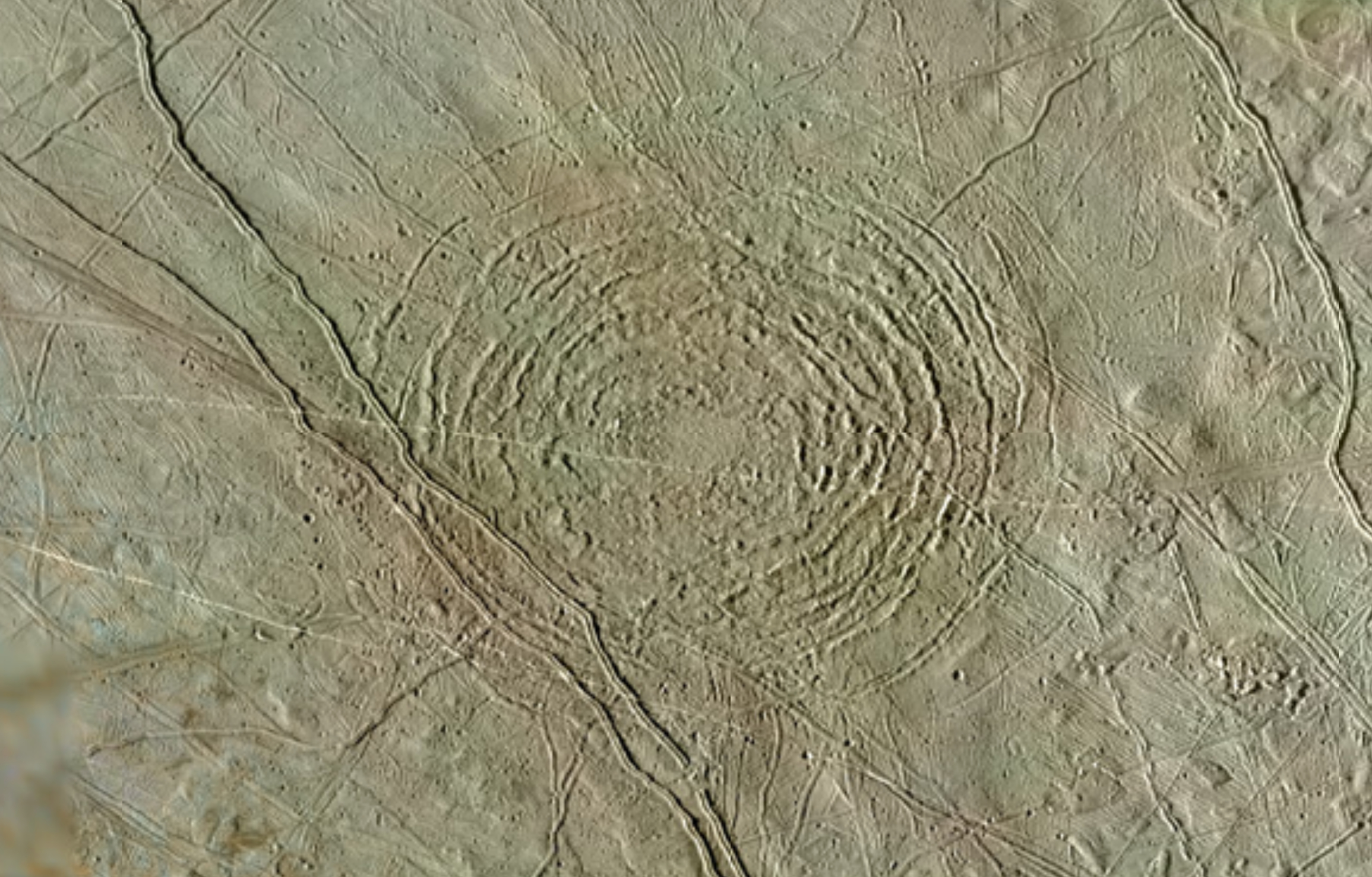 A screenshot from Europa Trek showing Tire, a multi-ring structure on Europa's surface thought to have formed as a result of an asteroid or comet impact. This feature, included in the new Europa Trek guided tour, is 87 miles (140 kilometers) in diameter. 