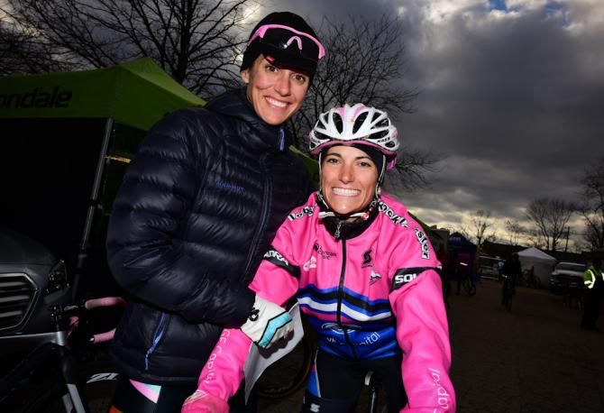 Courtenay McFadden and Nicole Duke trying to keep warm as the sun disappeared for the day
