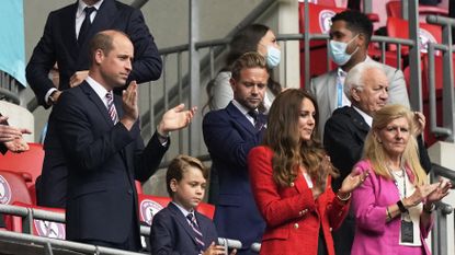 prince william l, duke of cambridge, and catherine, duchess of cambridge, clap flanking their son george, during the uefa euro 2020 round of 16 football match between england and germany at wembley stadium in london on june 29, 2021 photo by frank augstein pool afp photo by frank augsteinpoolafp via getty images