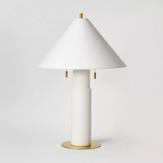 white ceramic table lamp with tapered shade