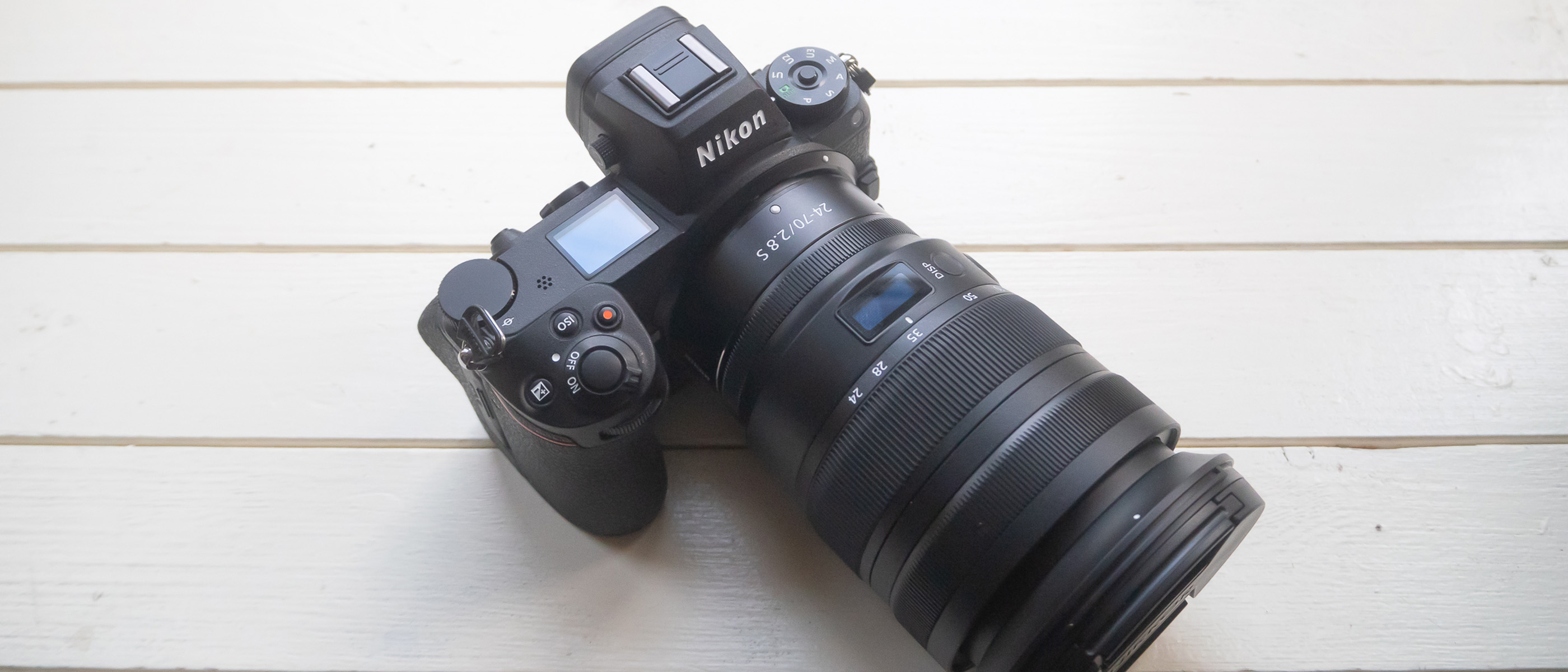 A photo of the Nikon Z6 II from above on a white wooden table