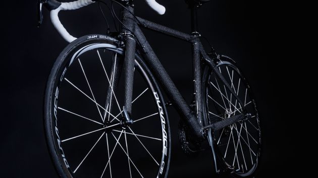 DSM is showing a prototype frameset made with Dyneema carbon at a plastics trade show, along with Dyneema Carbon spokes