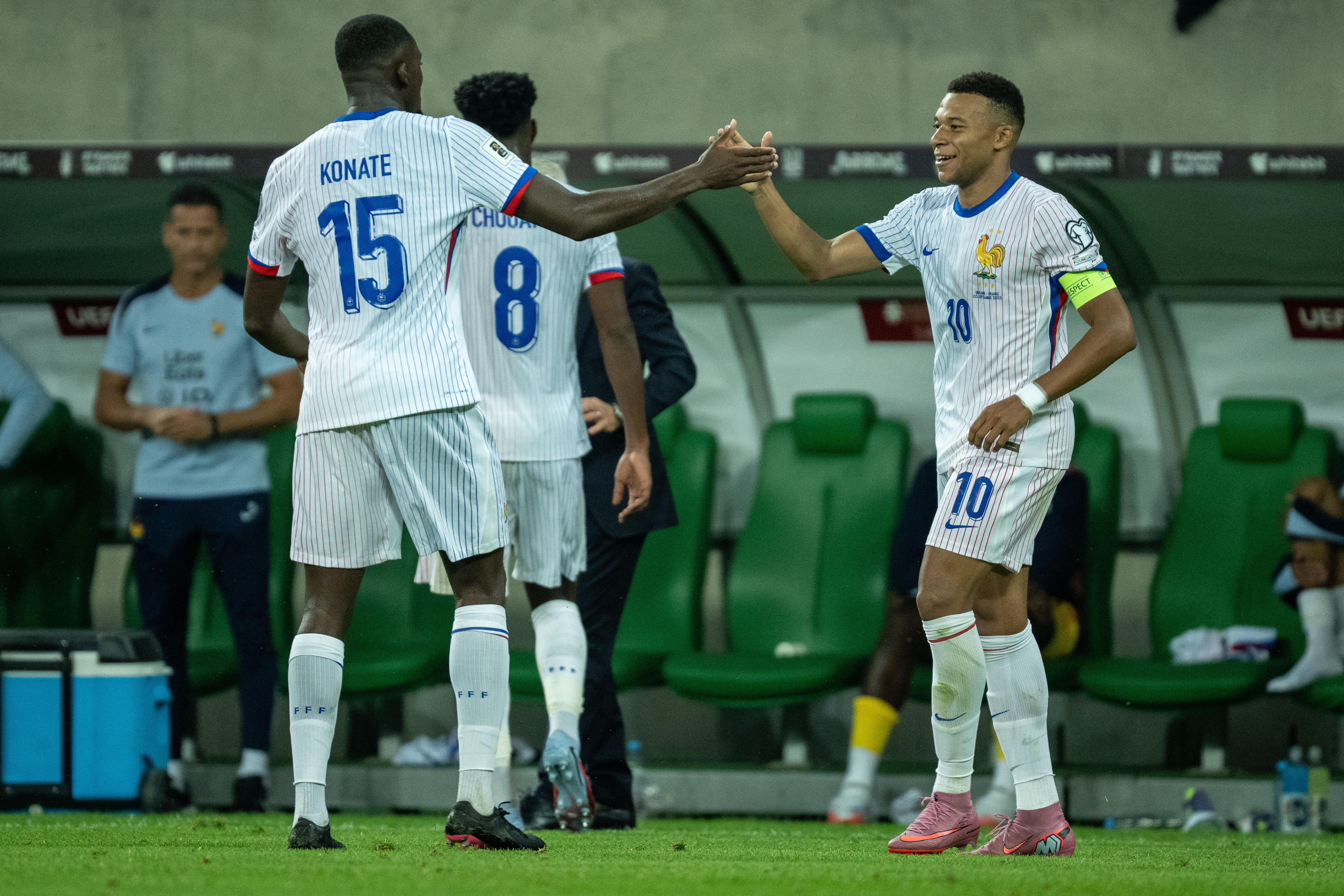 Liverpool&#039;s Ibrahima Konate and Real Madrid&#039;s Kylian Mbappe high-five after a goal for France