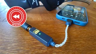 iFi mobile DAC on table with Rewind logo