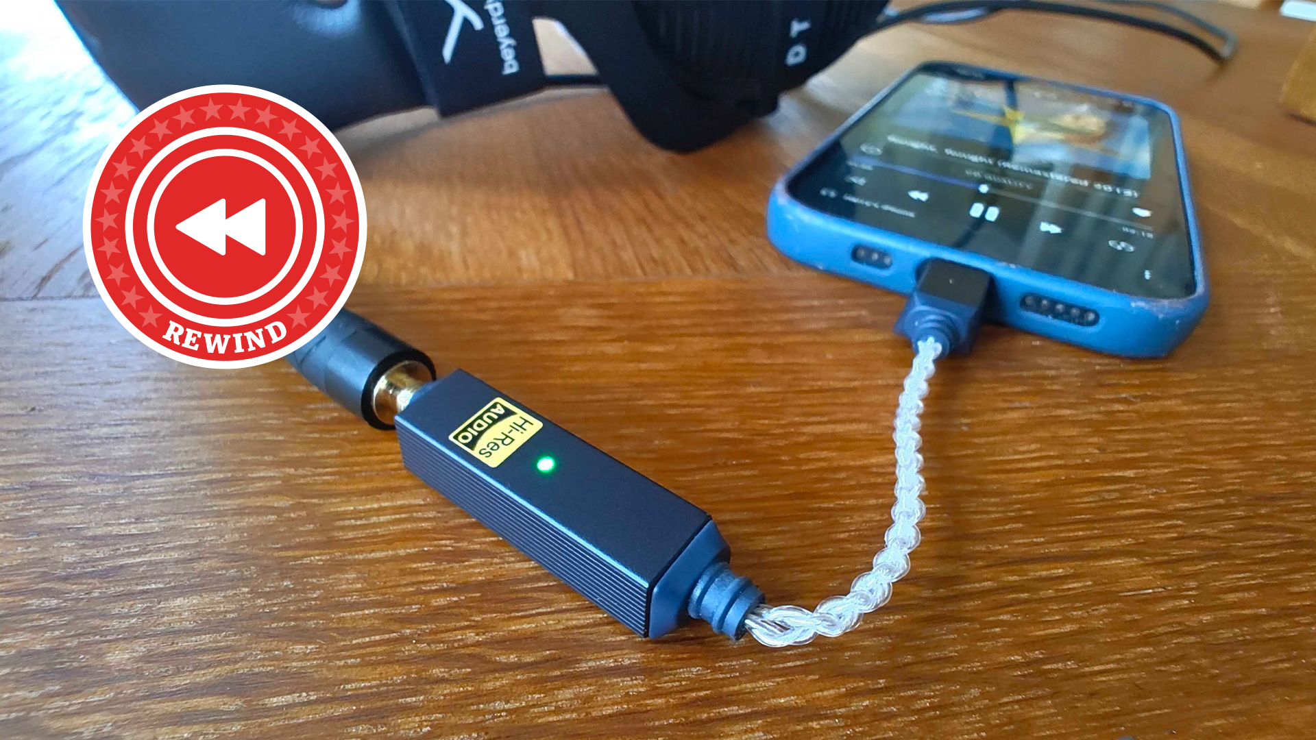 iFi mobile DAC on table with Rewind logo