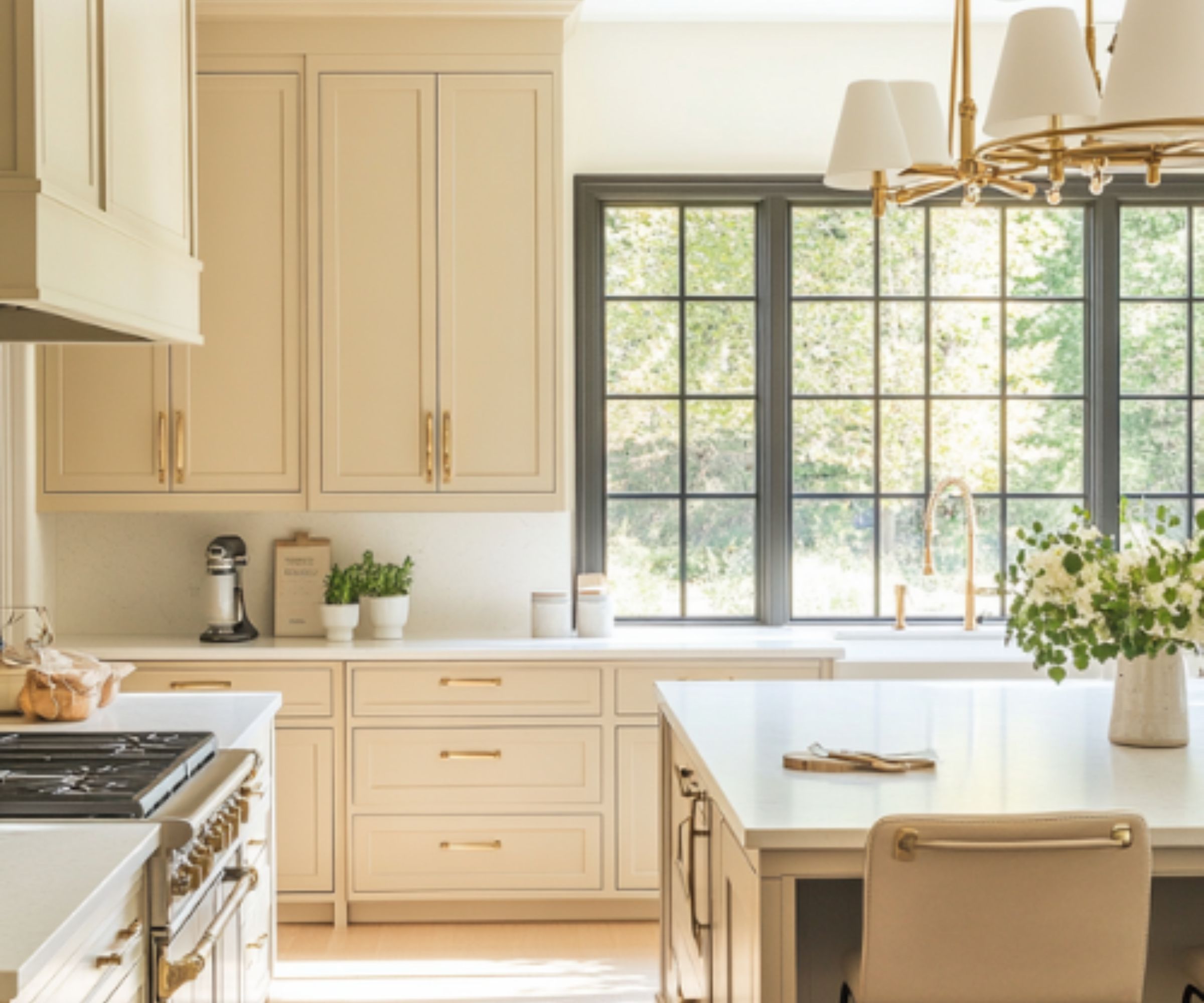 Kitchen with cream cabinetry