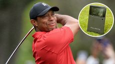 Tiger Woods hits a tee shot with a driver, with the Full Swing Kit Launch Monitor in the corner