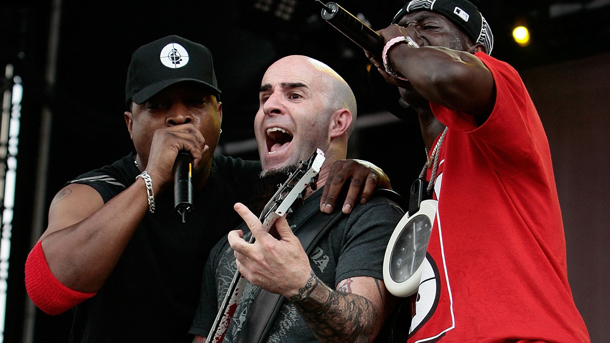 Scott Ian onstage with Chuck D and Flavor Flav in 2007