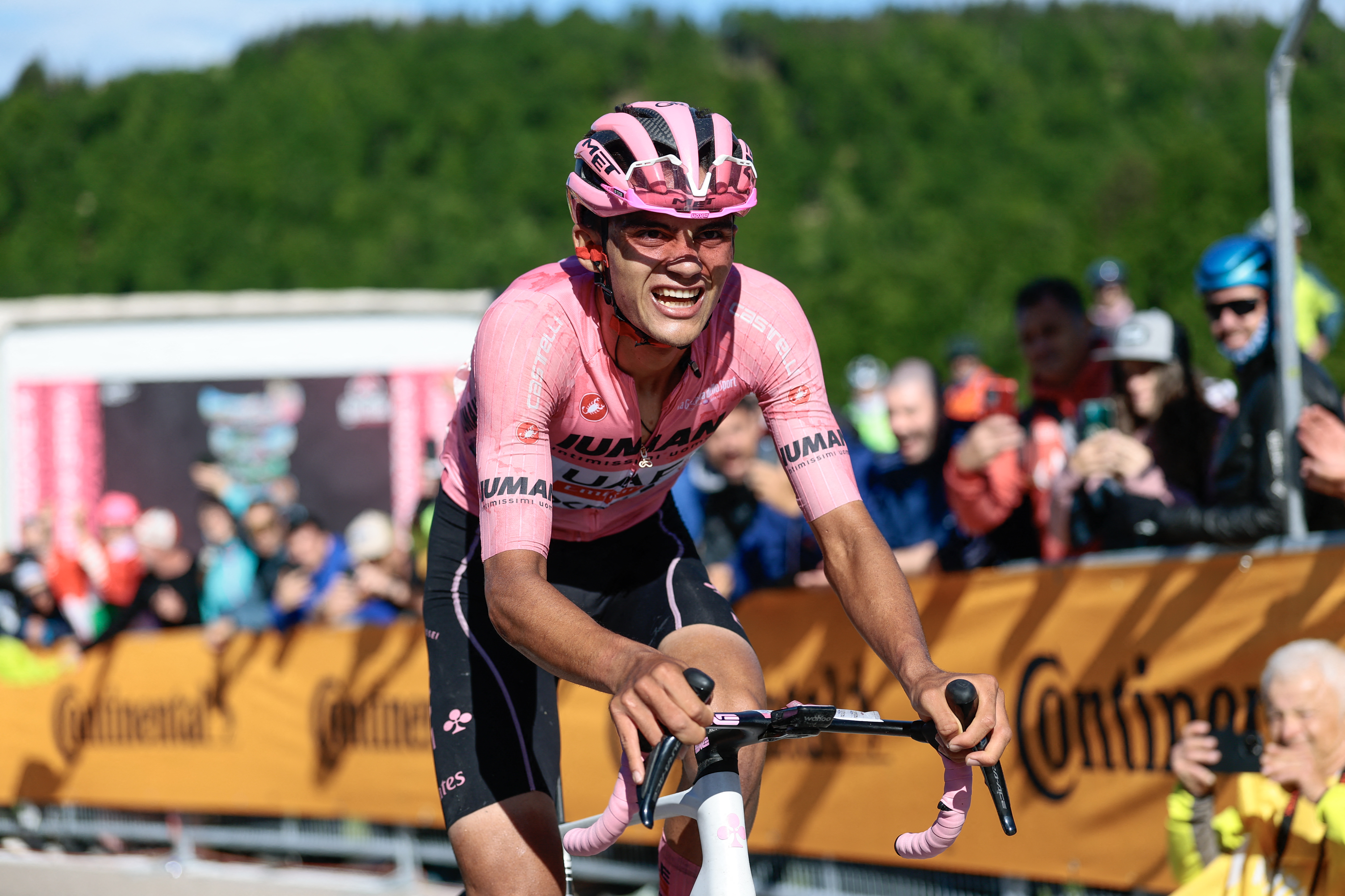 UAE Team Emirates XRG's Mexican rider Isaac Del Toro rides to crosses the finish line in the 16th stage of the 108th Giro d'Italia cycling race of 203kms from Piazzola sul Brenta to San Valentino on May 27, 2025. (Photo by Luca Bettini / AFP) (Photo by LUCA BETTINI/AFP via Getty Images)
