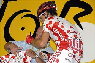 Sylvain Chavanel (Cofidis) signs a few polka dot jerseys.