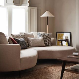 The John Lewis lozenge sofa in a cosy modern living room