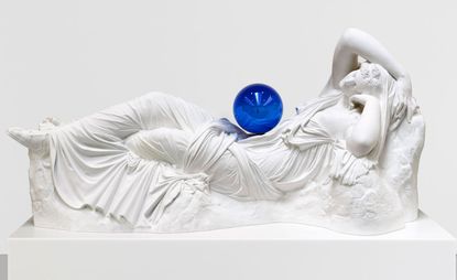 Sculpture with blue sphere