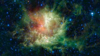 NASA Wide-field Infrared Survey Explorer observed the star-forming cloud NGC 281 in the constellation of Cassiopeia as it appears to be chomping through the cosmos, earning it the nickname the Pac-man nebula.