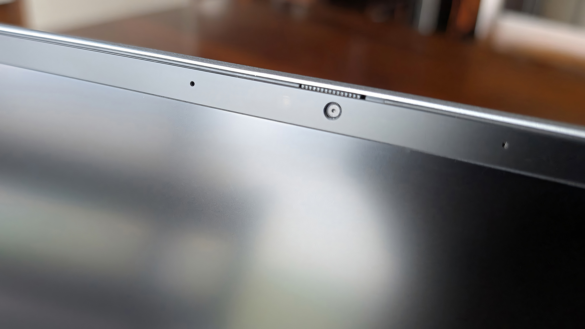 A closeup of the webcam and privacy slider on the Geekom GeekBook X16 Pro.