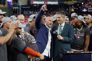 Kevin Burkhardt of Fox Sports and Houston Astros GM James Click after 2022 World Series