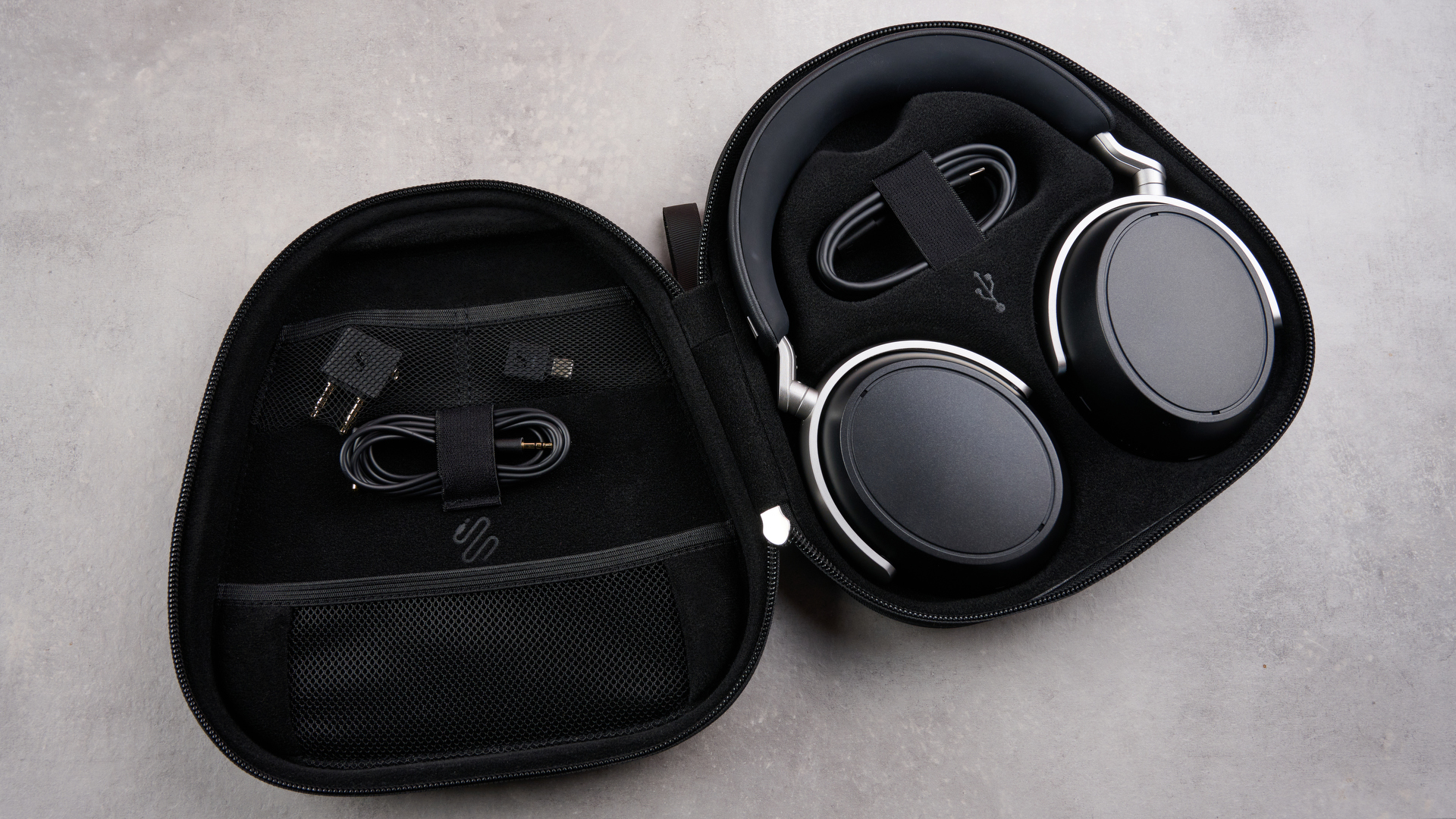 Sennheiser HDB 630 headphones in carry case