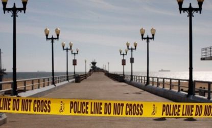 California's Seal Beach Pier was closed by authorities after a tsunami warning, the sort of weather alarms the proposed GOP budget would cut.