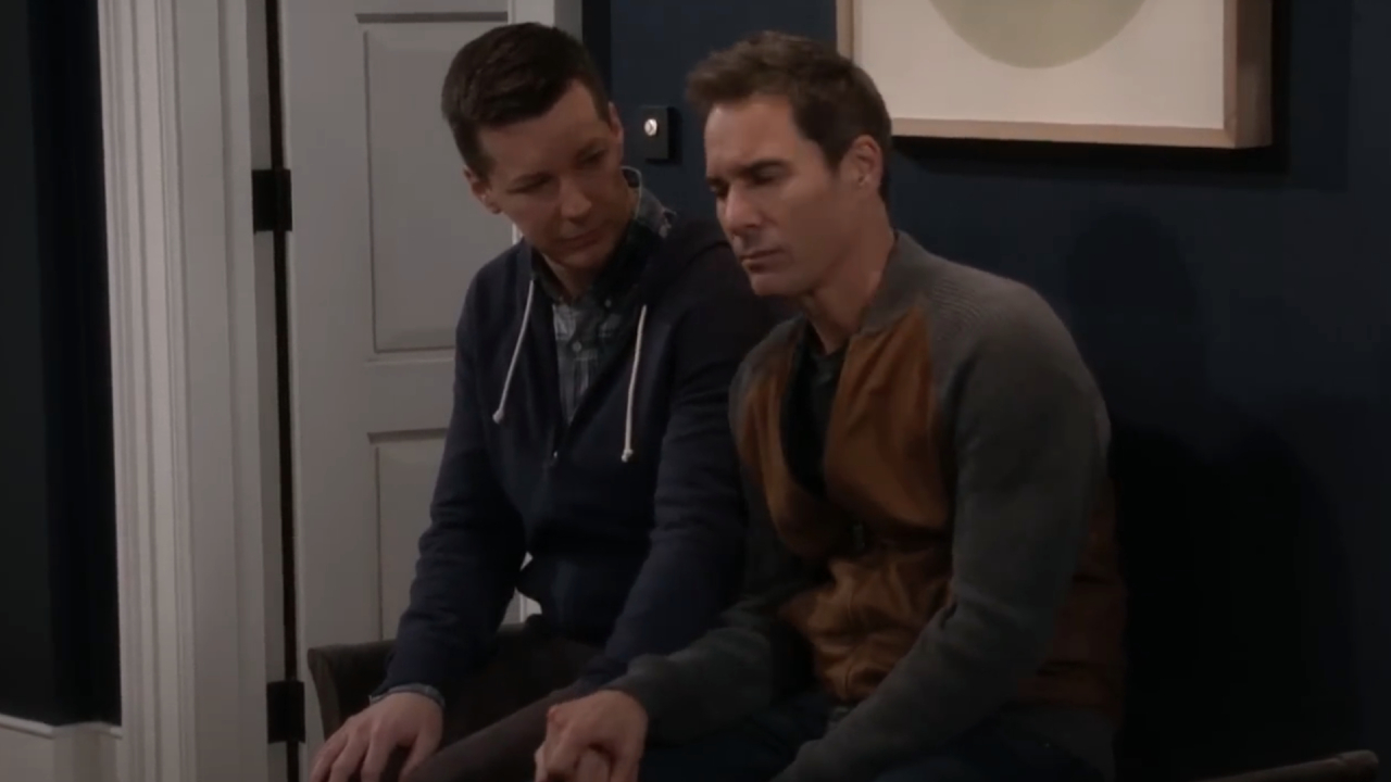 Sean Hayes and Eric McCormack holding hands on Will & Grace