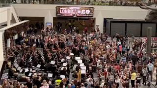 The City of Birmingham Symphony Orchestra performing in New Street Station