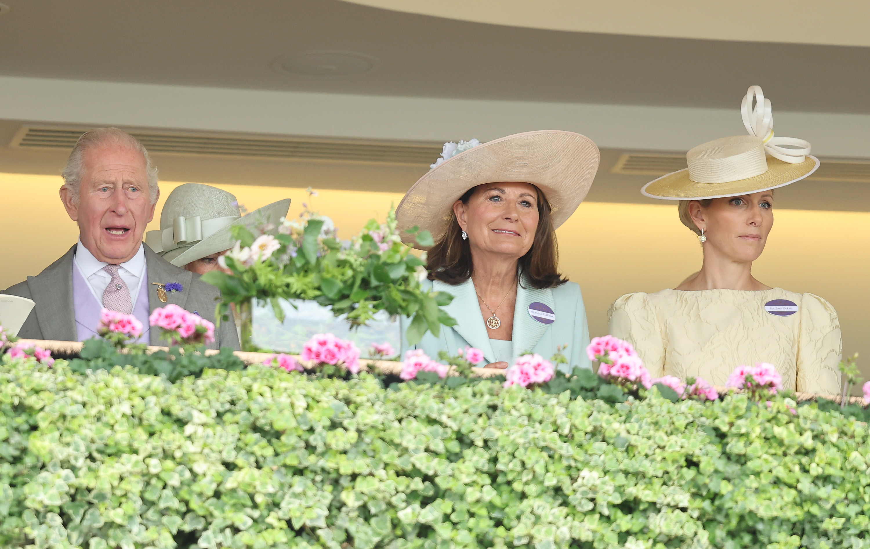 ASCOT, ENGLAND - JUNE 18: King Charles III, Carole Middleton and Zara Tindall react as they attend day three of Royal Ascot 2026 at Ascot Racecourse on June 18, 2026 in Ascot, England. (Photo by Chris Jackson/Getty Images)
