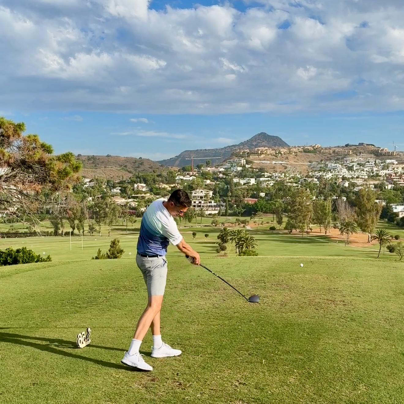 Joel Tadman hitting a drive off the 7th tee at El Paraiso golf club