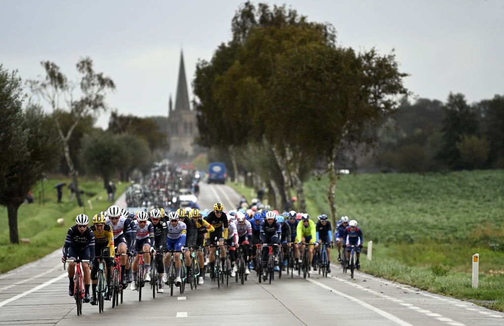 The peloton rides during the GentWevelgem In Flanders Fields one day cycling race 2325 km on October 11 2020 in Ieper Photo by DIRK WAEM BELGA AFP Belgium OUT Photo by DIRK WAEMBELGAAFP via Getty Images