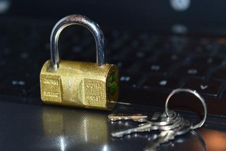 Locked padlock on laptop