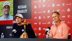 Keegan Bradley and Luke Donald chat either side of the Ryder Cup