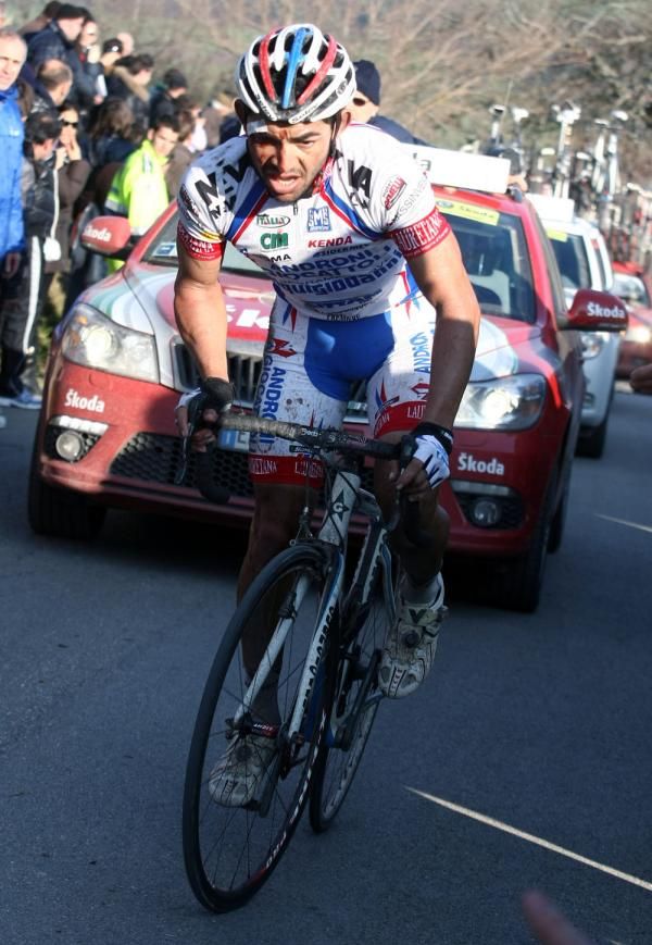 A bloodly Jose Serpa (Androni-Giocatolli) climbs alone at the back of the field