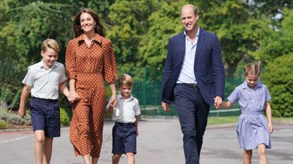  Prince George, Princess Charlotte and Prince Louis, accompanied by their parents Prince William and Catherine, Princess of Wales, arrive for a settling in afternoon at Lambrook School