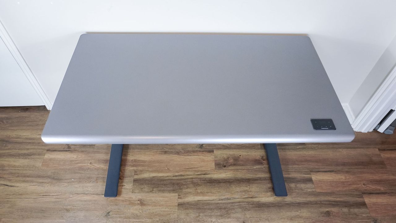 An overhead shot of the Autonomous SmartDesk 5 showing off its desktop and integrated touch controls
