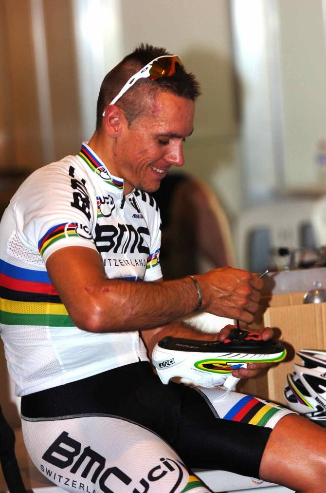 A fresh pair of cleats of Gilbert's world champion-themed DMT shoes