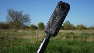 Insta360 X5 on selfie stick