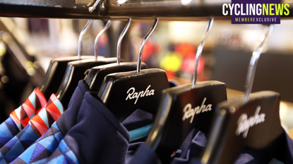 Rapha Jerseys hanging on a rail
