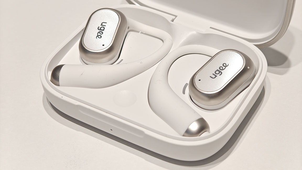 Ugee FreSound; open earbuds on a white table