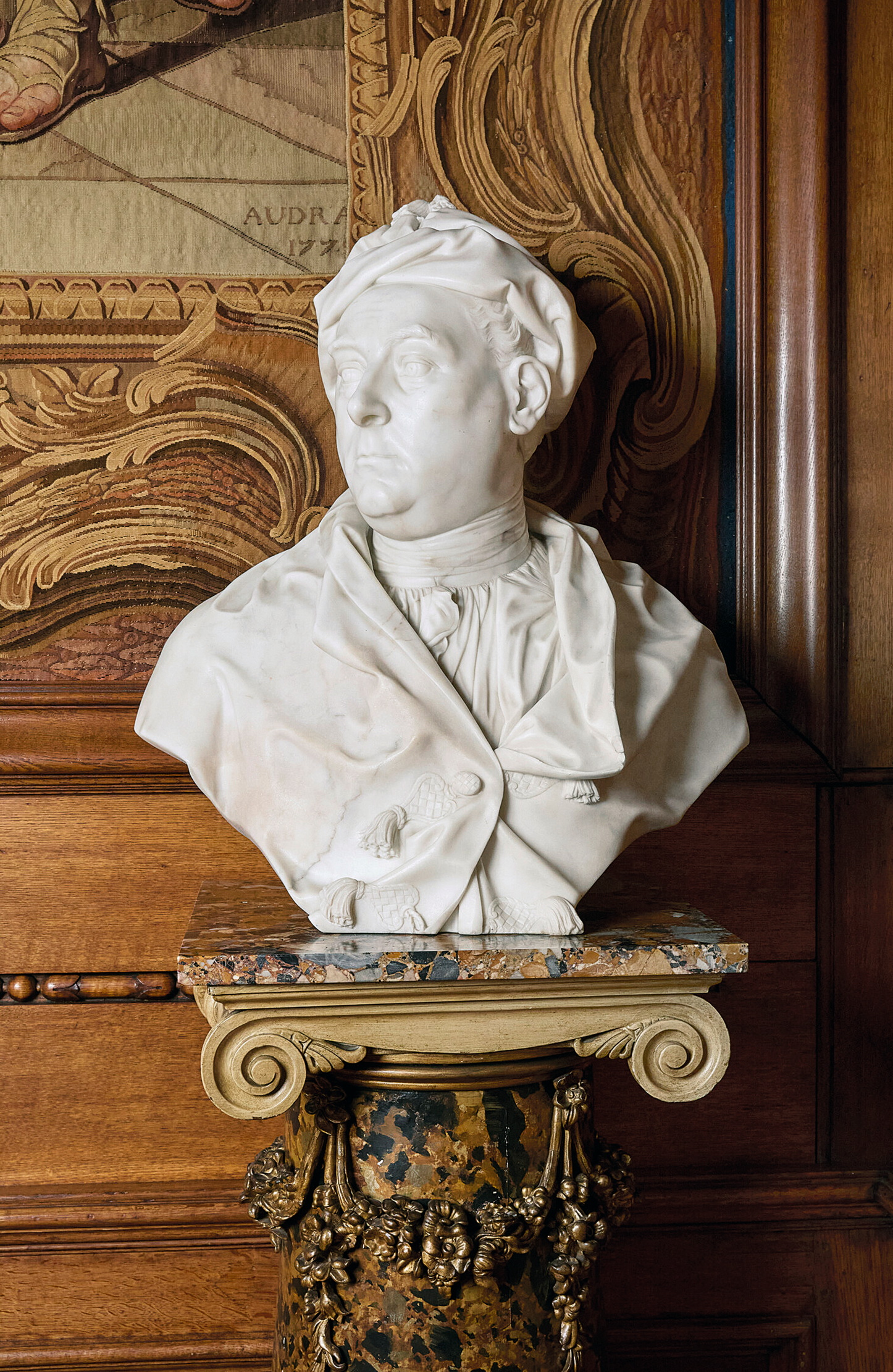 A bust of Handel on a marble plinth.