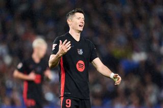 SAN SEBASTIAN, SPAIN - NOVEMBER 10: Robert Lewandowski of FC Barcelona reacts during the LaLiga match between Real Sociedad and FC Barcelona at Reale Arena on November 10, 2024 in San Sebastian, Spain. (Photo by Juan Manuel Serrano Arce/Getty Images)