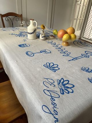 A hand-painted tablecloth