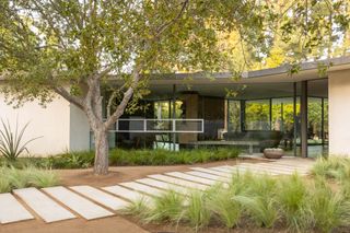 A green landscape with a walkway