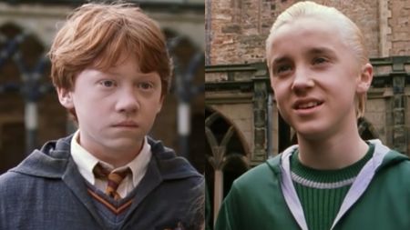 Rupert Grint and Tom Felton in Harry Potter and the Chamber of Secrets standing off.