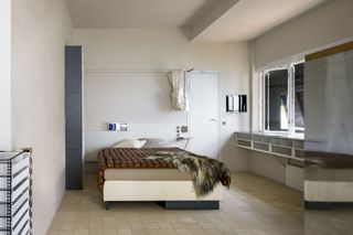 Renovated bedroom, styled, in eileen gray's house in the south of France