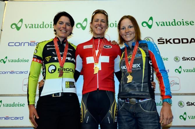Team RE:CM's Ariane Kleinhans proudly wears the Swiss national champion's jersey following her victory on Sunday. On the left is Milena Landtwig (second) and on the right is Cornelia Hug (third).
