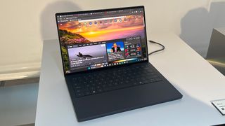 A Dell XPS 14 sitting on display