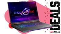 An Asus ROG Strix G16 gaming laptop on a pink and red deals background