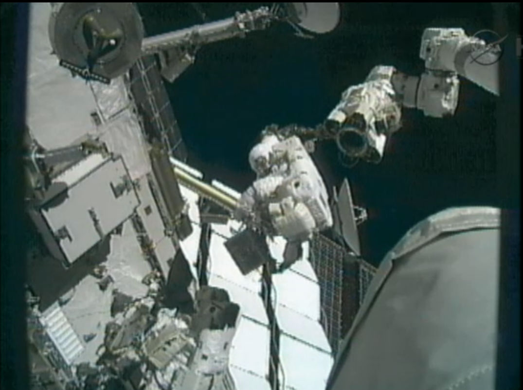 Akihiko Hoshide on the space station robotic arm