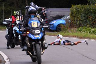 OUDENAARDE BELGIUM OCTOBER 18 Julian Alaphilippe of France and Team Deceuninck QuickStep World Champion Jersey Crash Motorbike during the 104th Tour of Flanders 2020 Ronde van Vlaanderen Men Elite a 2433km race from Antwerpen to Oudenaarde RVV20 FlandersClassic on October 18 2020 in Oudenaarde Belgium Photo by Luc ClaessenGetty Images