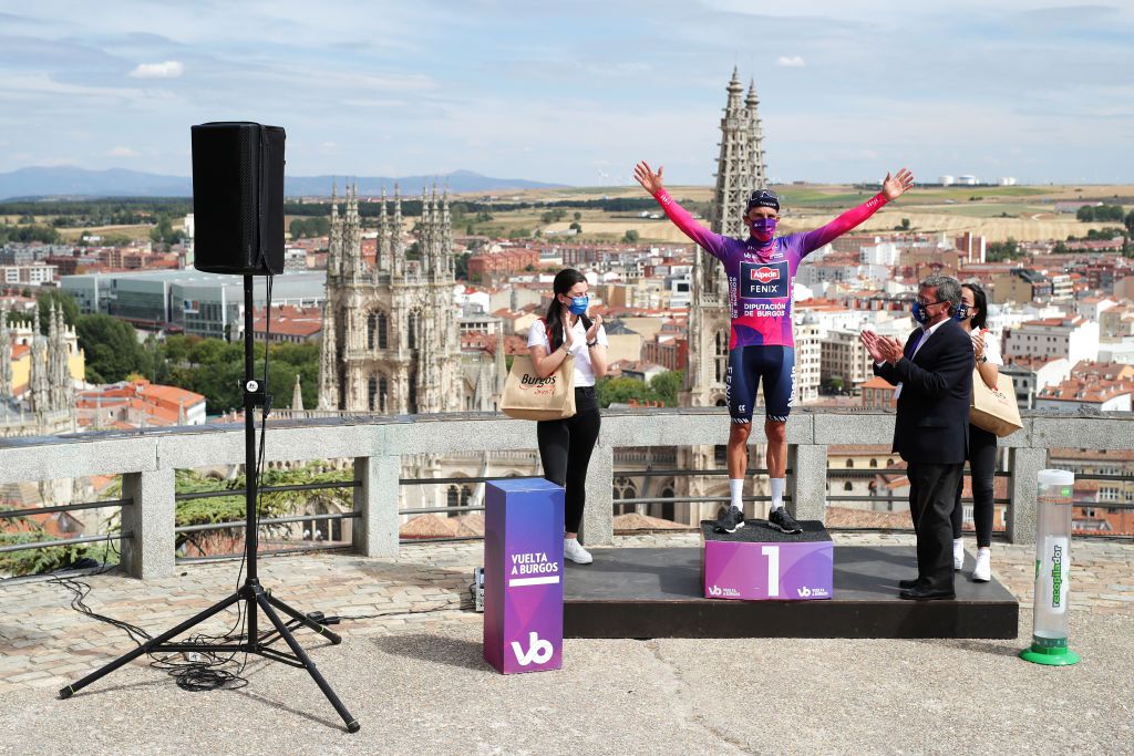 BURGOS SPAIN AUGUST 03 Edward Planckaert of Belgium and Team AlpecinFenix Purple Leader Jersey celebrates at podium during the 43rd Vuelta a Burgos 2021 Stage 1 a 161km stage from BurgosCatedral to BurgosAlto del Castillo 980m VueltaBurgos BurgosCycling CapitalMundialdelCiclismo catedral2021 on August 03 2021 in Burgos Spain Photo by Gonzalo Arroyo MorenoGetty Images
